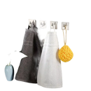 Bathroom towels and sponge on hooks.