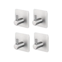 Four adhesive metal hooks.