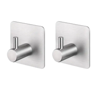Two brushed metal adhesive hooks.