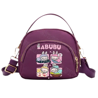 Purple cartoon-decorated handbag.