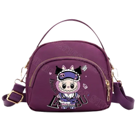 Purple cartoon-themed handbag.