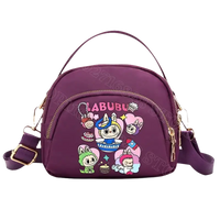 Purple cartoon-decorated handbag.