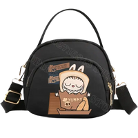 Black cartoon-themed handbag.