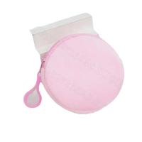 Round pink coin purse.