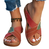 Cross-strap leather sandals.