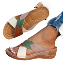 Leaf-accented, multi-colored women’s sandals.