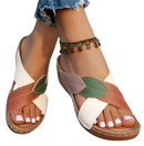 Leaf-accented crisscross sandals.