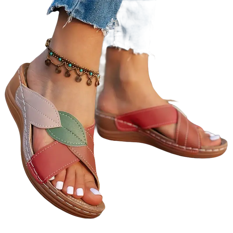 Leaf-adorned crisscross sandals.