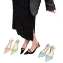 Pointed-toe slingback heels with bow detail.