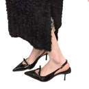 Black patent leather slingback heels.