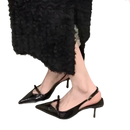 Black patent leather slingback heels.