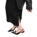 Black patent leather slingback heels.