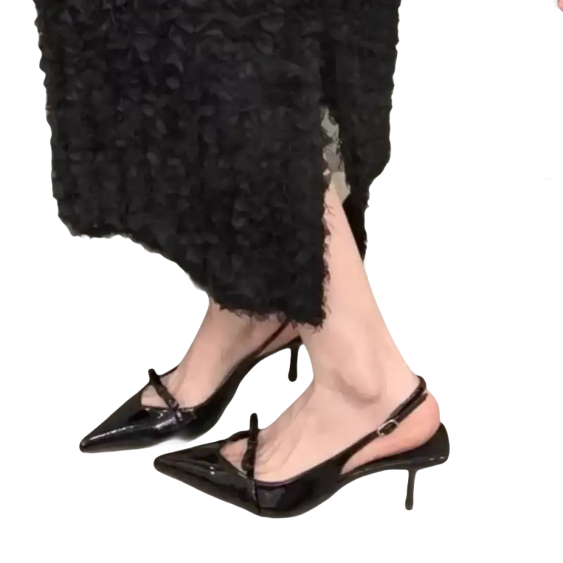 Black patent leather slingback heels.