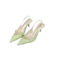 Pair of light green slingback heels.