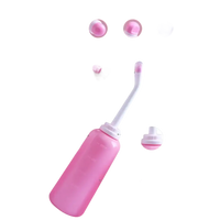 Pink portable bidet.