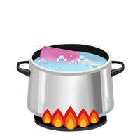Boiling pot with pink object.