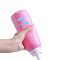 Pink squeezable bottle.