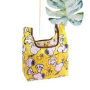 Yellow Snoopy-patterned reusable shopping bag.
