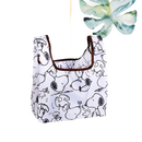 White Snoopy-patterned tote bag.