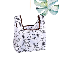 Snoopy-patterned reusable shopping bag.