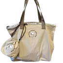 Beige tote bag with Snoopy design.
