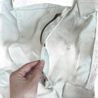 Open beige tote bag.