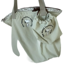 Snoopy-themed tote bag with matching drawstring pouch.