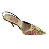 Floral embroidered slingback heel.