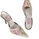 Floral embroidered slingback heels.