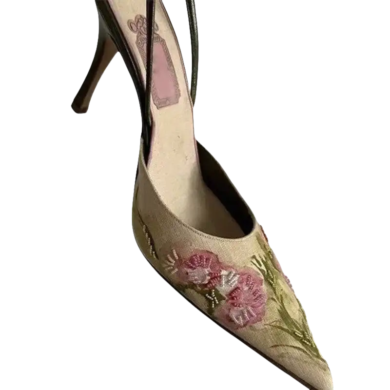 Floral embroidered high-heeled shoe.