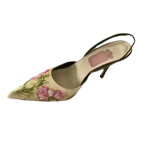 Floral embroidered slingback heel.