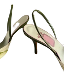 Pair of green slingback heels.