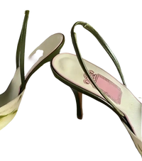 Pair of green slingback heels.