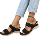 Black floral wedge sandals.