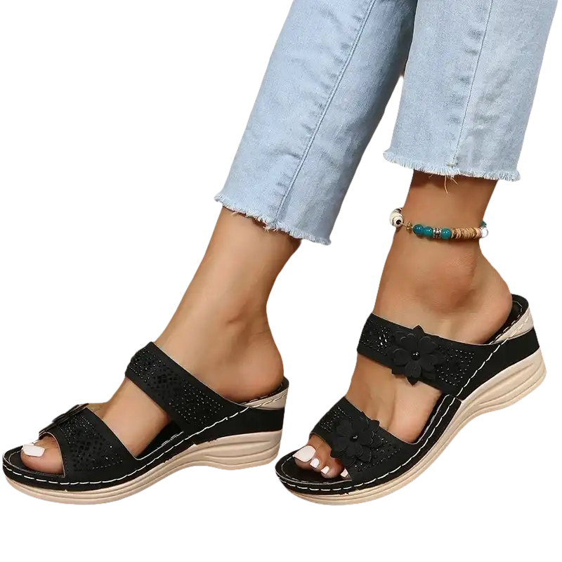 Black floral wedge sandals.
