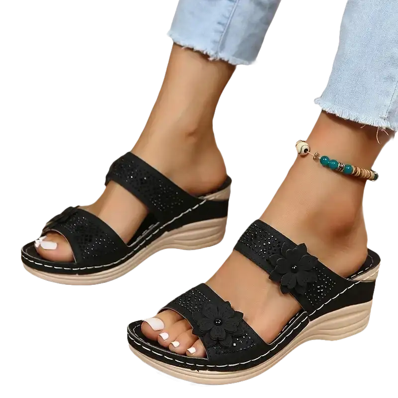 Black floral wedge sandals.
