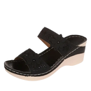 Black floral wedge sandal.