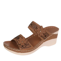 Brown floral-embellished wedge sandal.
