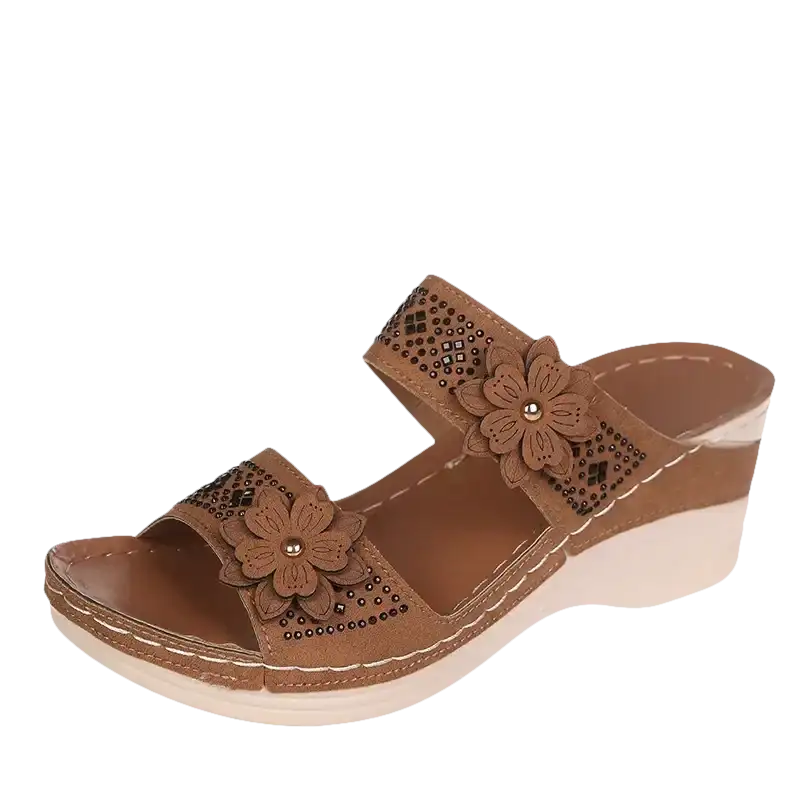 Brown floral-embellished wedge sandal.