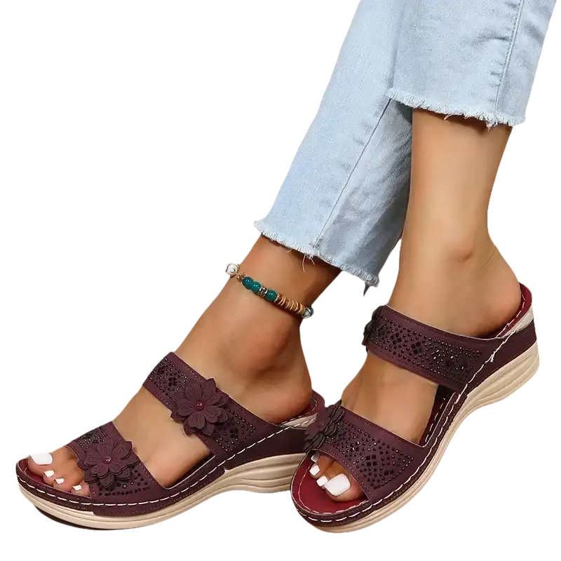 Burgundy floral-embellished platform sandals.