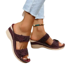 Burgundy floral-embellished wedge sandals.