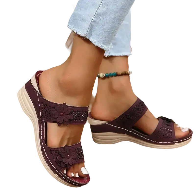 Burgundy floral-embellished wedge sandals.