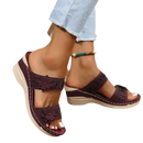 Burgundy floral-embellished wedge sandals.