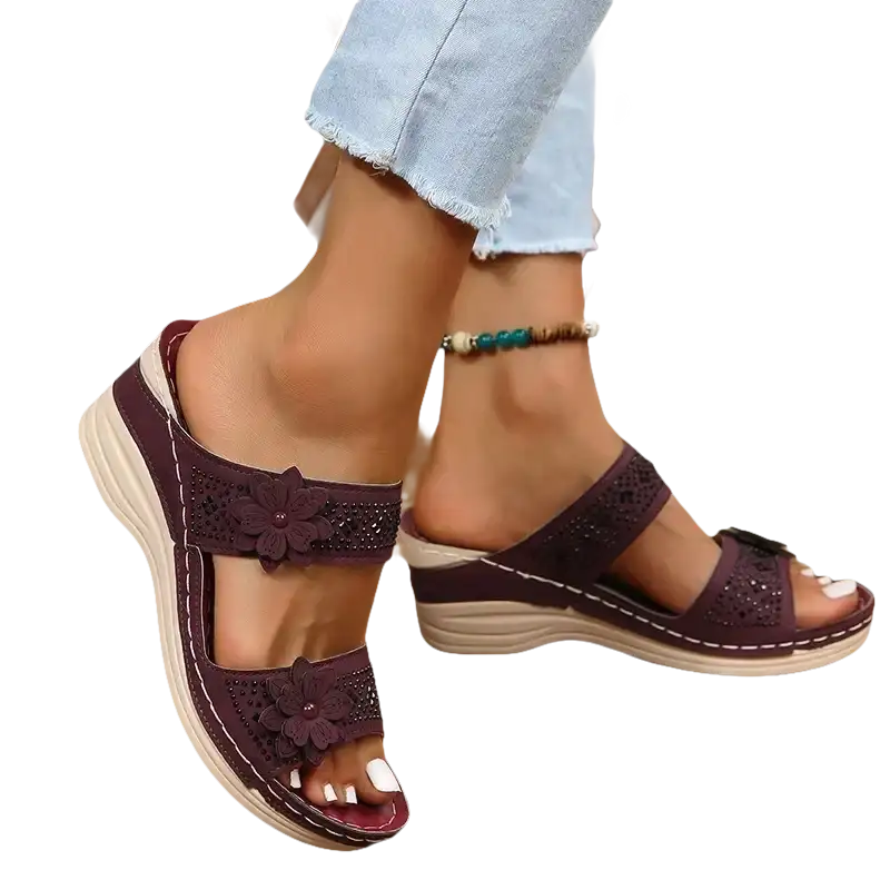 Burgundy floral-embellished wedge sandals.