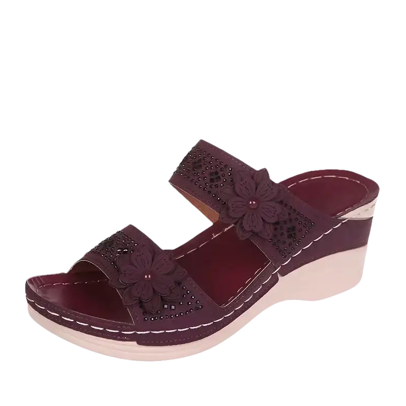 Burgundy floral-embellished wedge sandal.