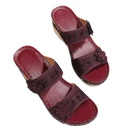 Burgundy floral-accented wedge sandals.