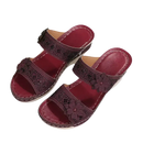 Maroon floral-accented wedge sandals.