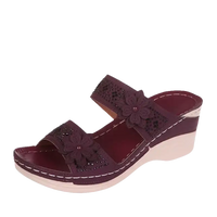 Maroon floral wedge sandal.