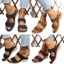 Women’s floral-accented wedge sandals.