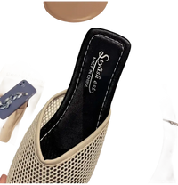 Beige mesh mule.